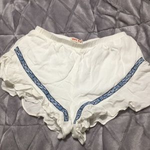 White with blue pattern shorts